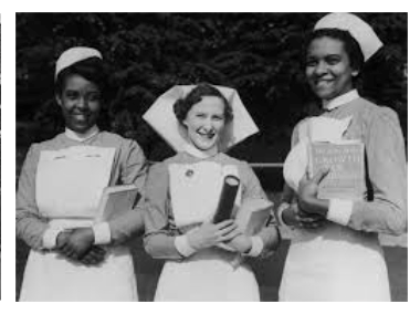 Black and white photo showing 3 nurses